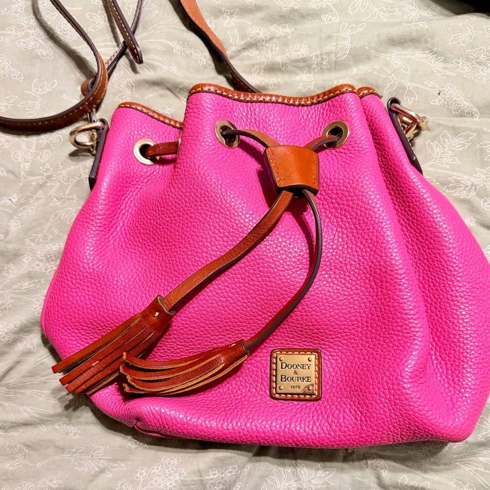 Dooney and Bourke Women’s Pink Leather Drawstring Bucket Bag with Brown Trim